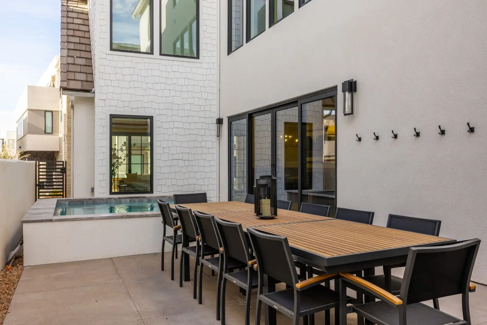 Lula Bay — Outdoor dining table beside the patio doors