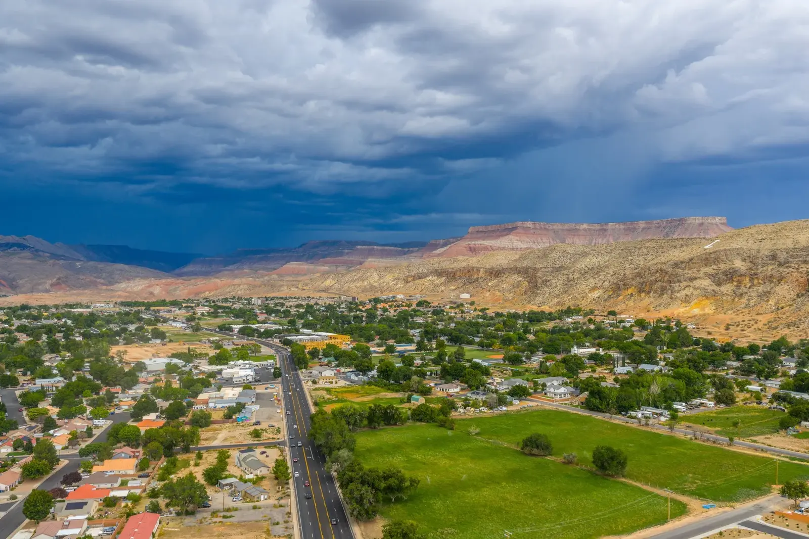 Aerial view of the surrounding community and red-rock landscape near The Silo Suites