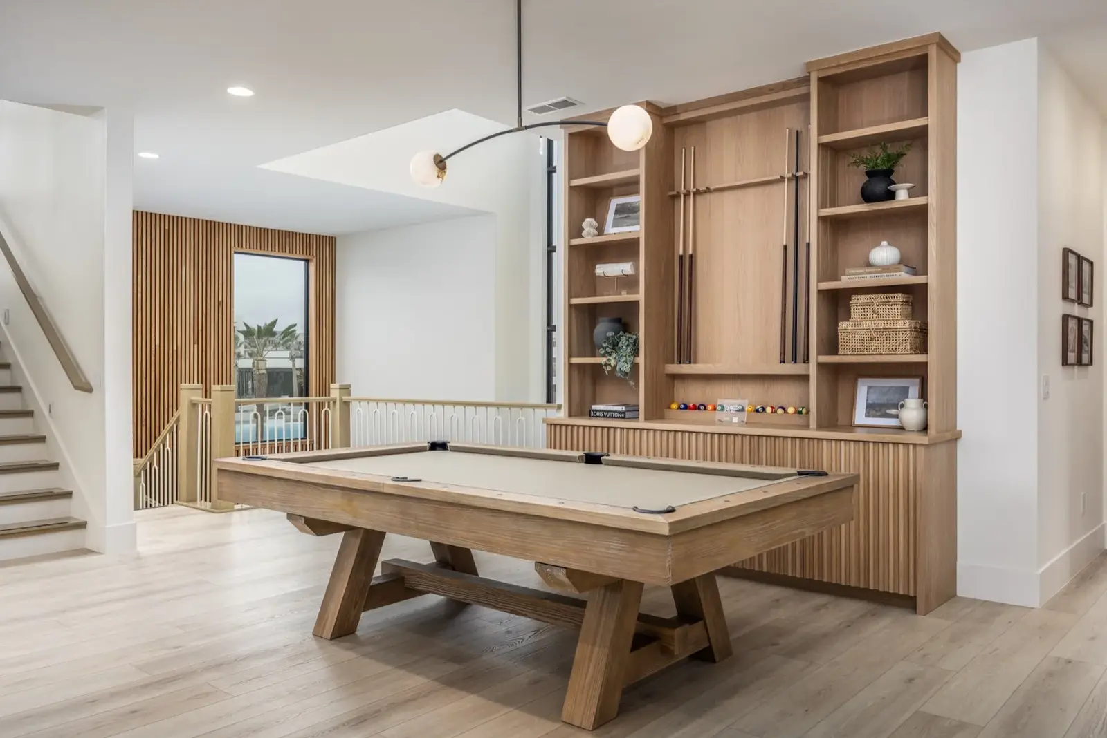 The Oasis Utah — Billiards room with wood cabinetry