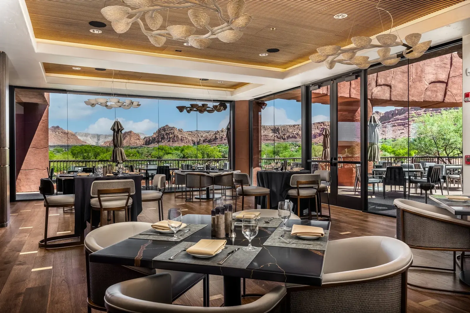 Dining room with large windows and red-rock views at Entrada