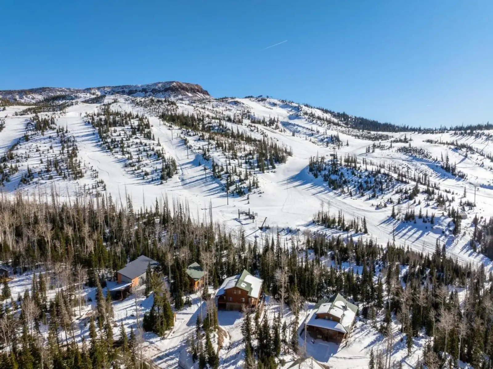 Brian Head — Aerial view of snowy mountains and cabins