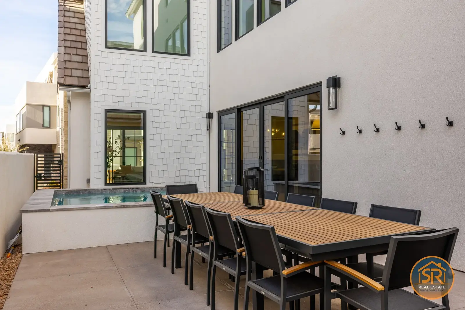 Outdoor dining table on a shaded patio — from Sam Reed’s photography portfolio