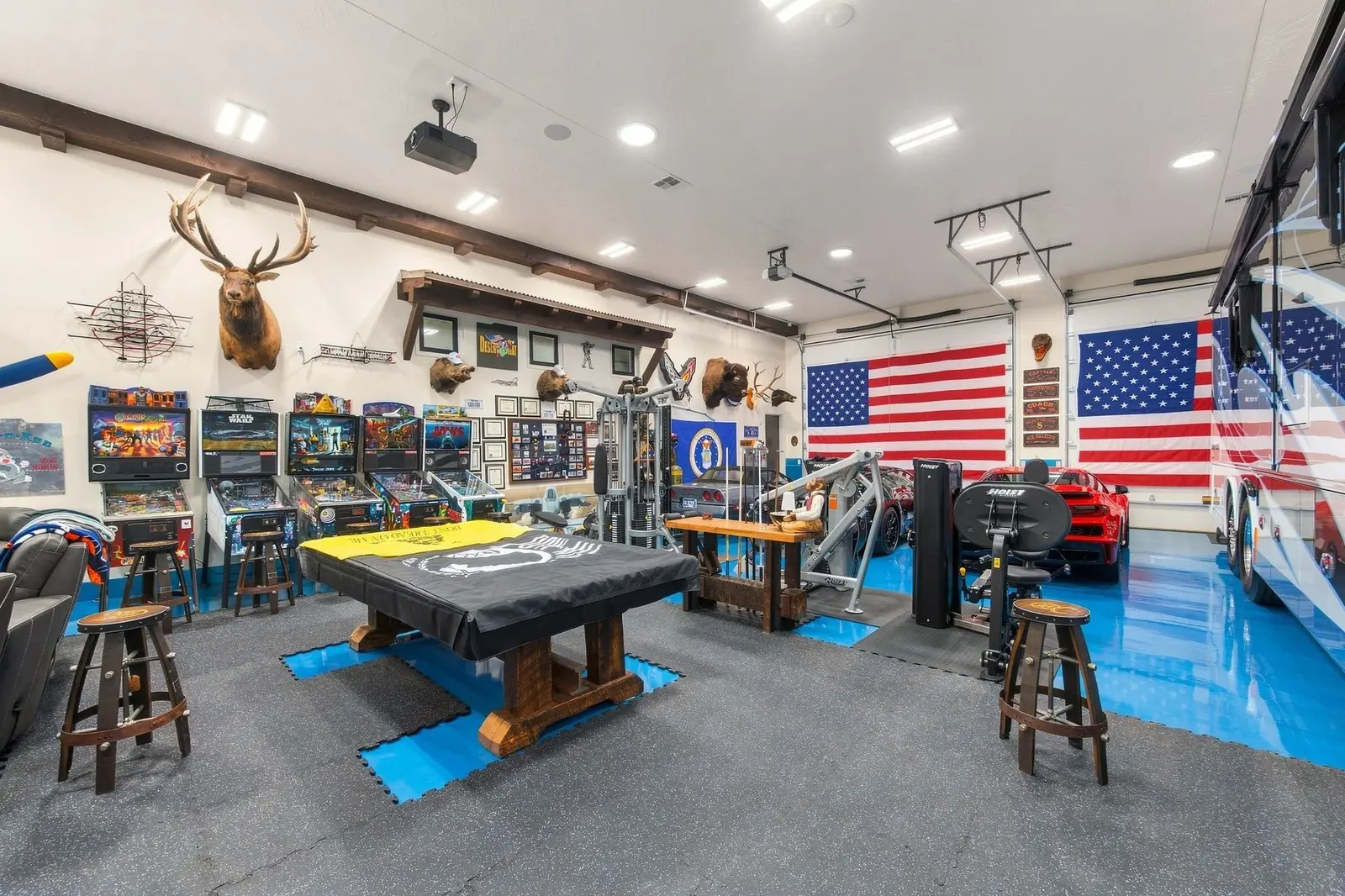 Recreation room with a pool table and a bright blue floor
