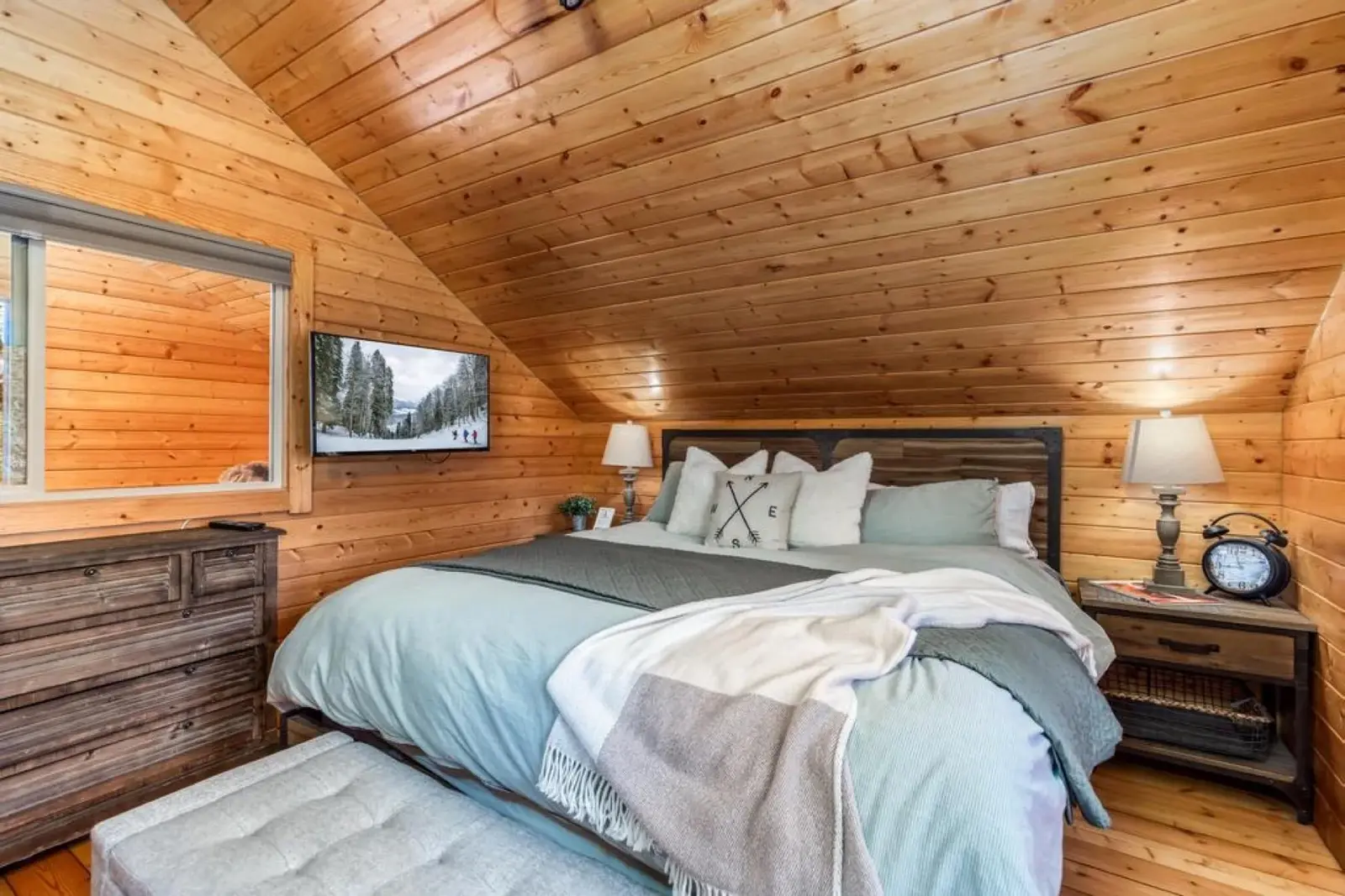 Brian Head — Wood-lined bedroom with pale blue bedding