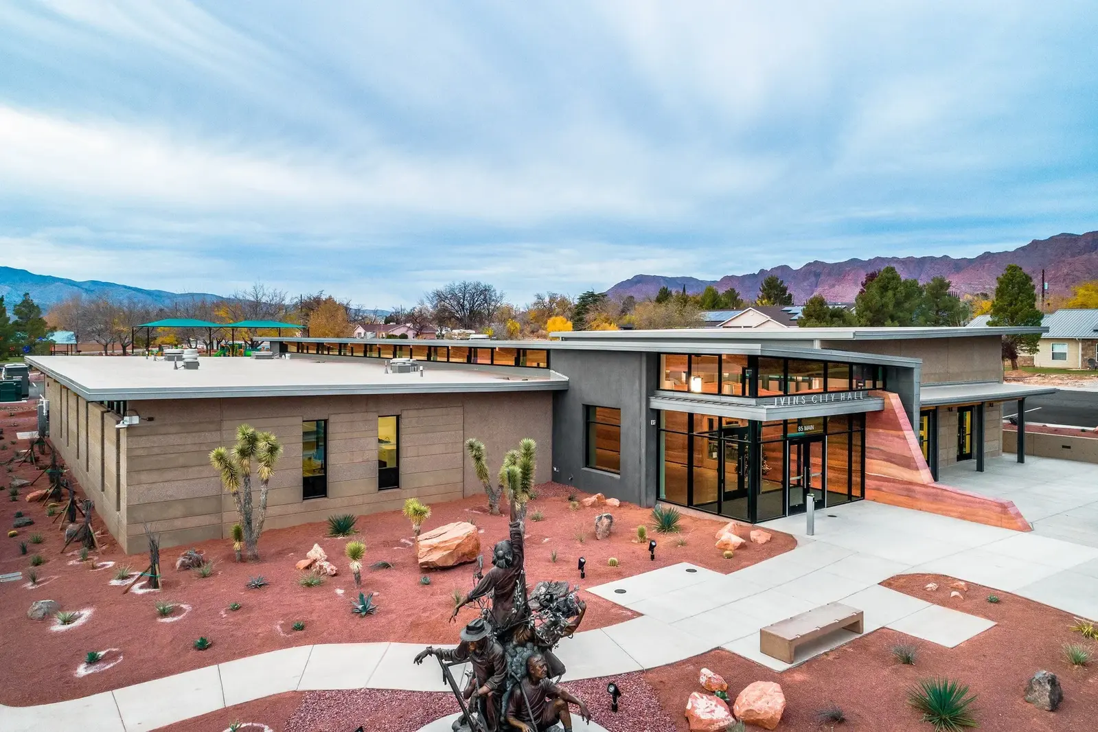 Elevated view of Ivins City Hall and its landscaped plaza with sculpture.