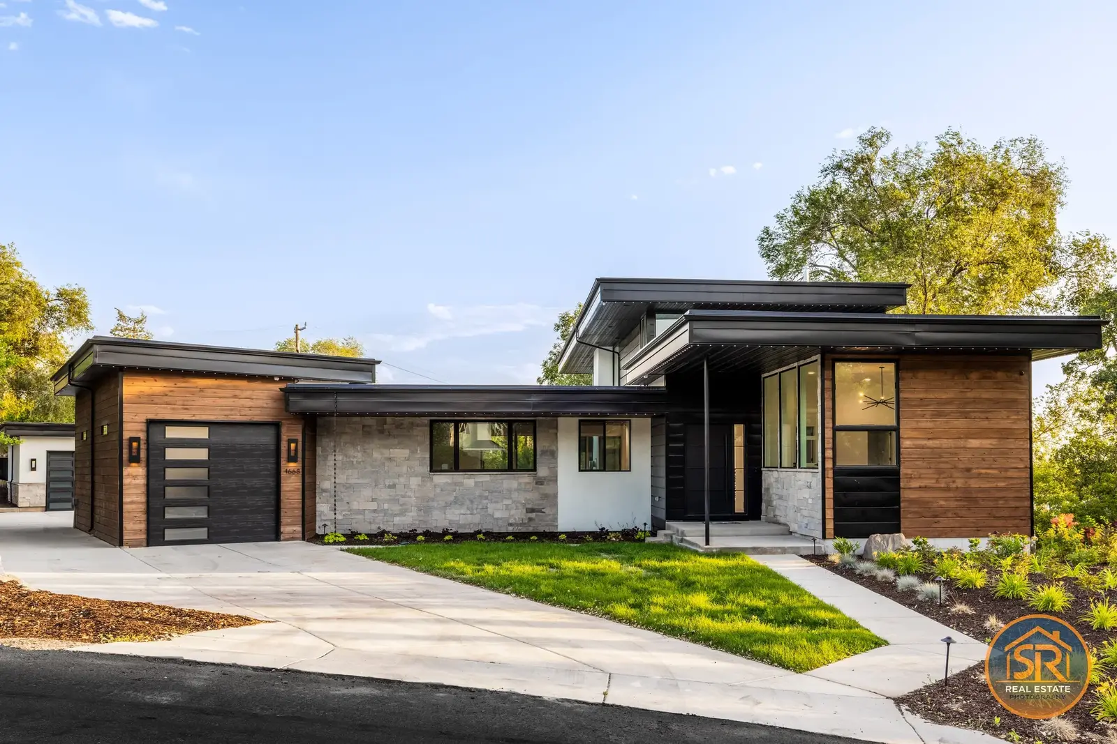 Contemporary wood-and-stone home exterior photographed by Sam Reed