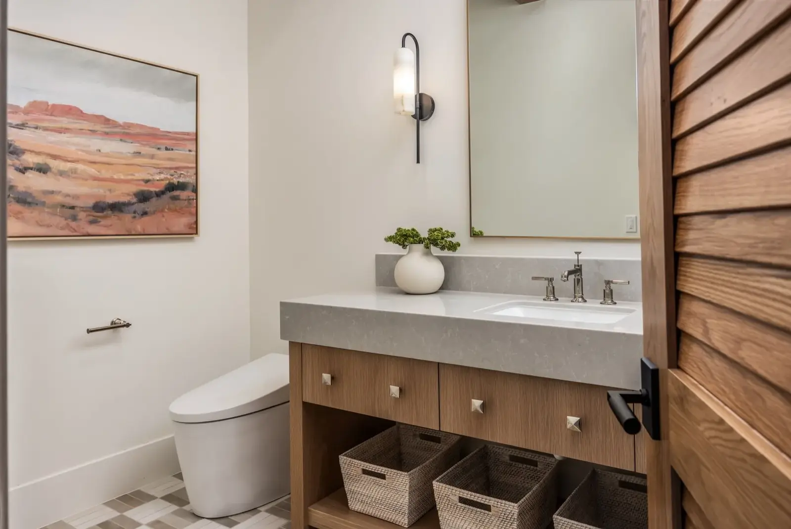 The Oasis Utah — Powder room with a wood vanity